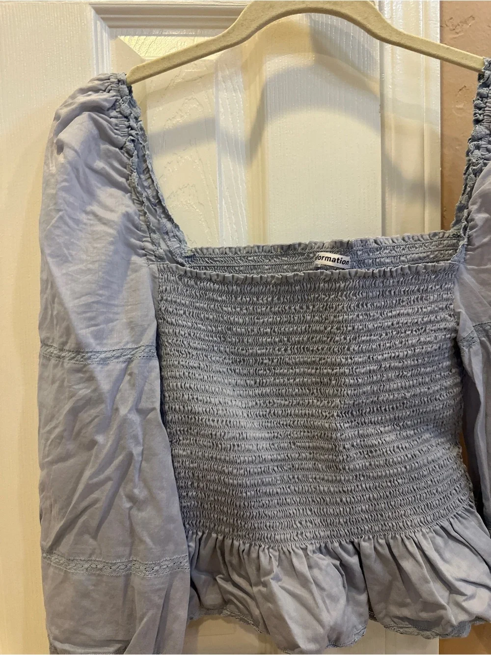 Reformation Roland Smocked Top in Mineral Blue